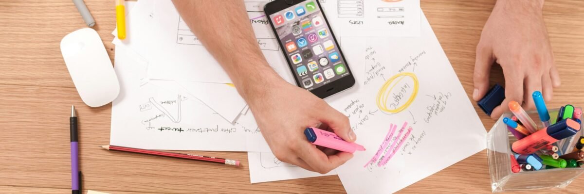 person writing on white paper