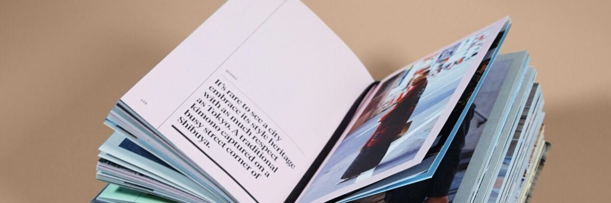 open book on top of several stacked books